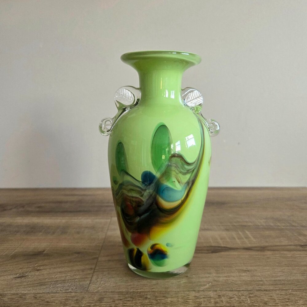 Vintage Dalian Glass Company green vase with multicolor abstract desigh.